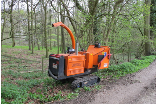 An image of machine use in tree chipping in Carlsbad, CA